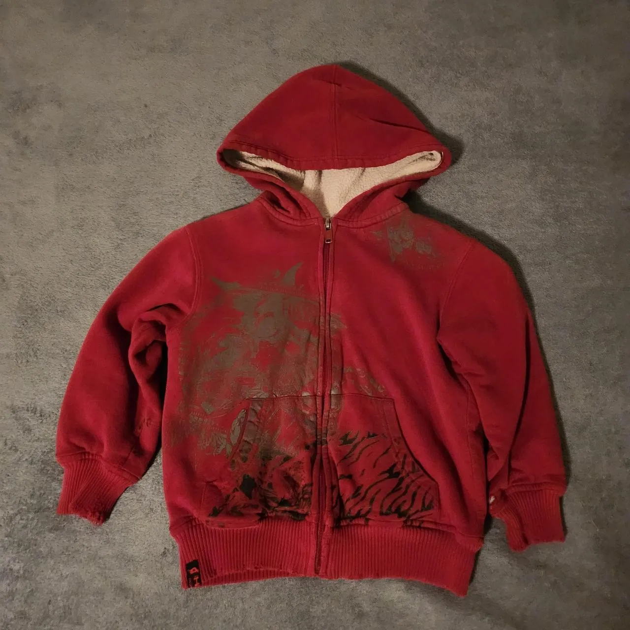 Tony Hawk boys' red and burgundy zip-up jumper laid flat